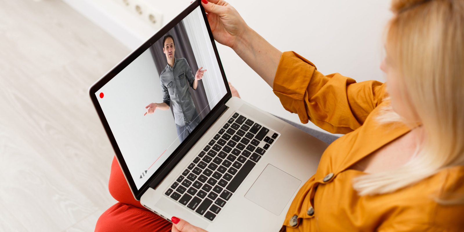 Close-up Of Businesswoman Video Conferencing With Colleague On Laptop